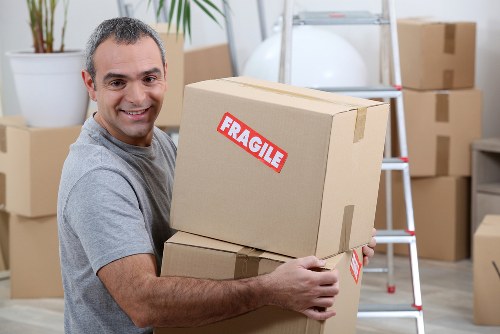 Local packing team organising household items in Finchley