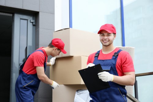 Professional house removals team handling a Finchley home move with careful loading