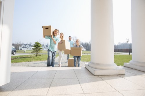 Business relocation team delivering office items to a new Finchley workspace