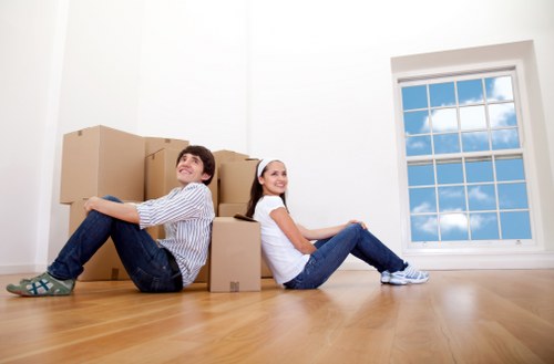 Boxes and household items being loaded for a flat removal