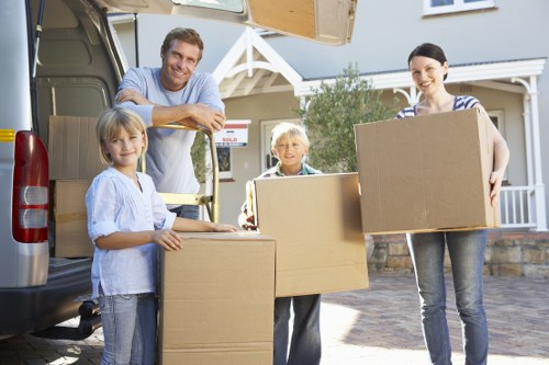 Professional moving team completing a job with careful, controlled handling