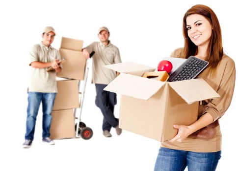 Office equipment and boxes prepared for a commercial relocation