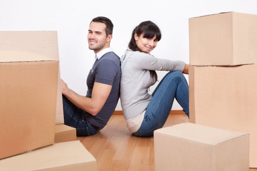Furniture pick-up process in Finchley showing careful lifting and loading
